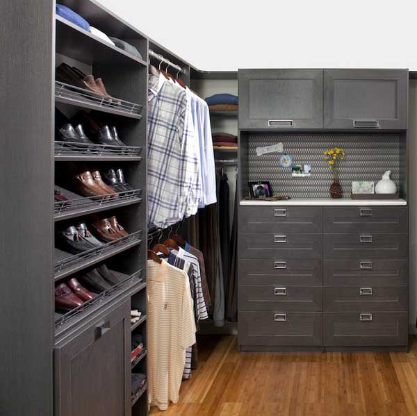 Shoe fences in custom built bedroom closet for him
