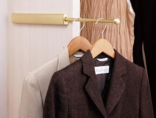 pull out valet bar with hanging suit jackets