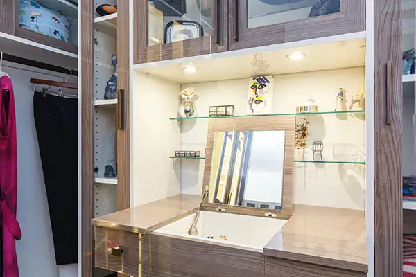 Custom walk-in closet idea with flip up vanity