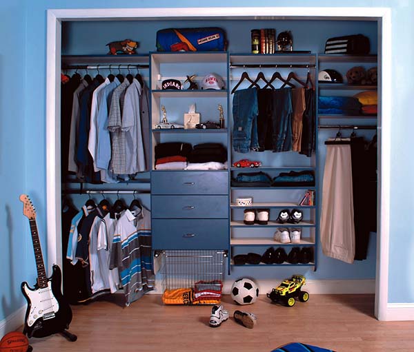 Boys reach in closet with custom storage solutions