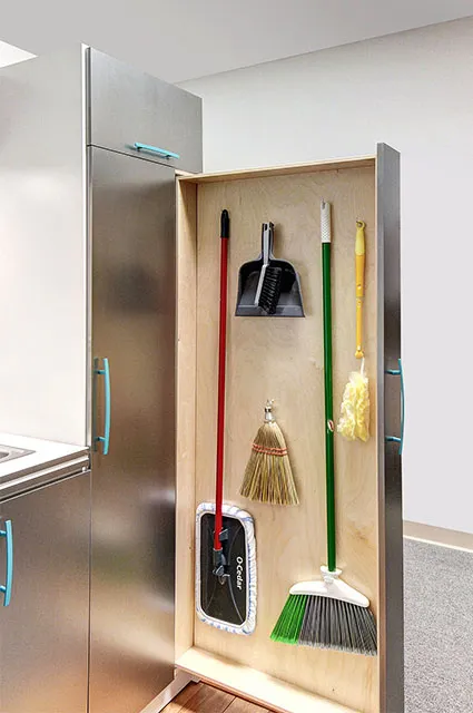 Laundry room design with verticial sliding doors