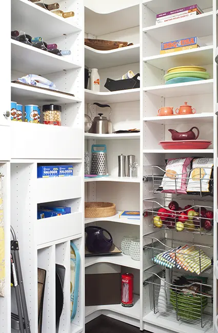 Custom pantry with L-shaped corner shelving