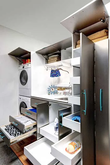 Laundry room showing maximized storage organized