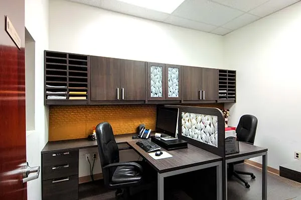Home office neatly organized for two
