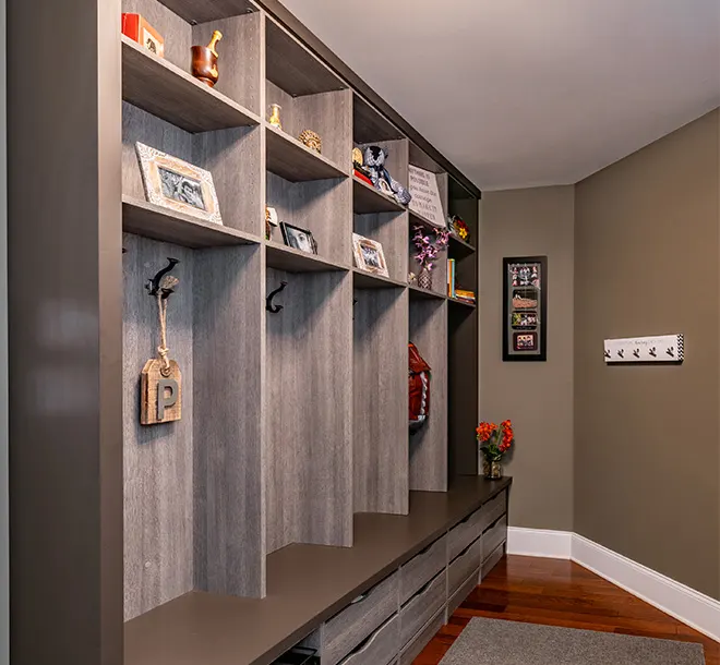 Mudroom with cubbies and underneath storage compartments