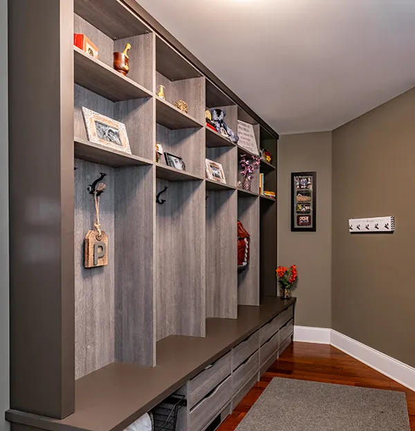 Organized mudroom with locked style cubbies for kids