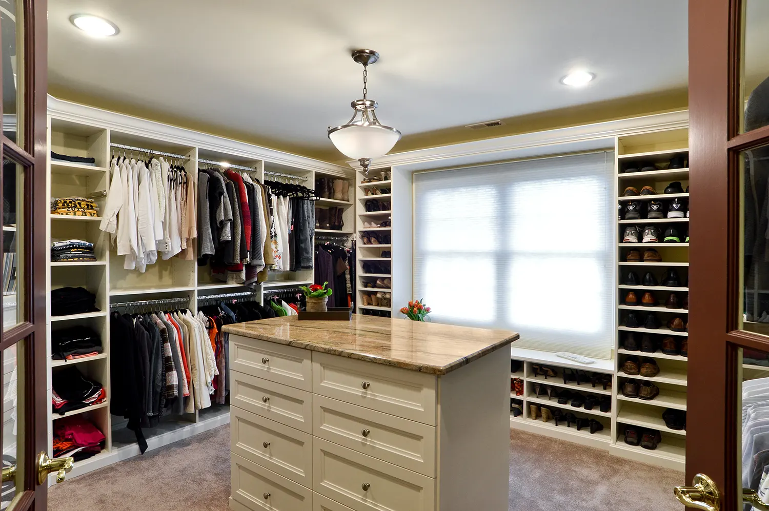 Beautiful and elegant walk-in closet organizer and system with center island in Philadelphia