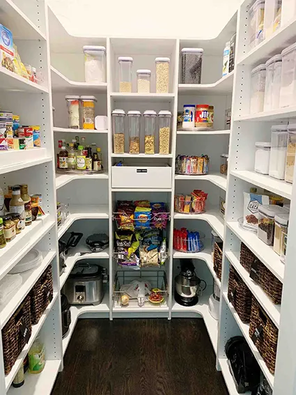 U-shaped kitchen pantry with food items organized