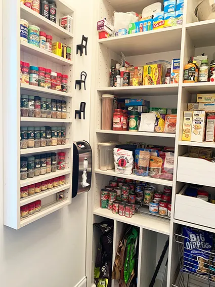 Custom pantry with white finish and custom shelves