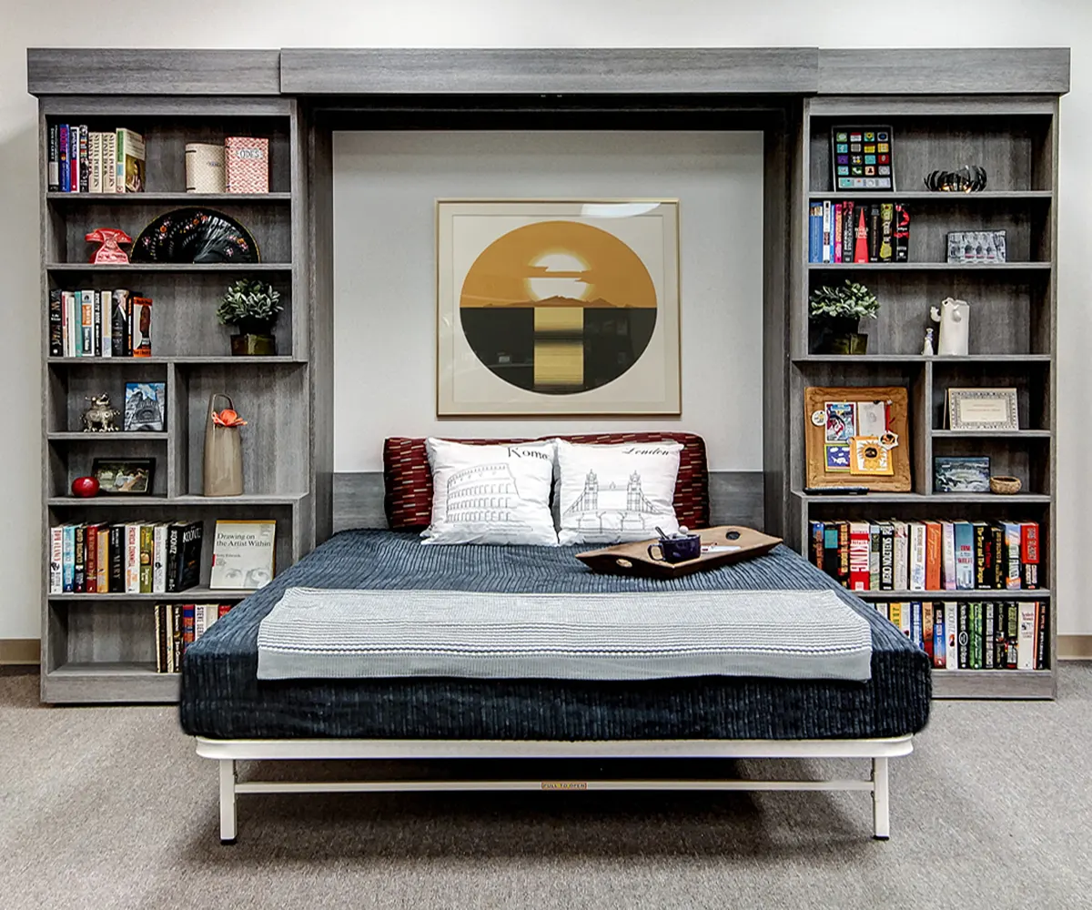 Sliding bookcase with Murphy bed open