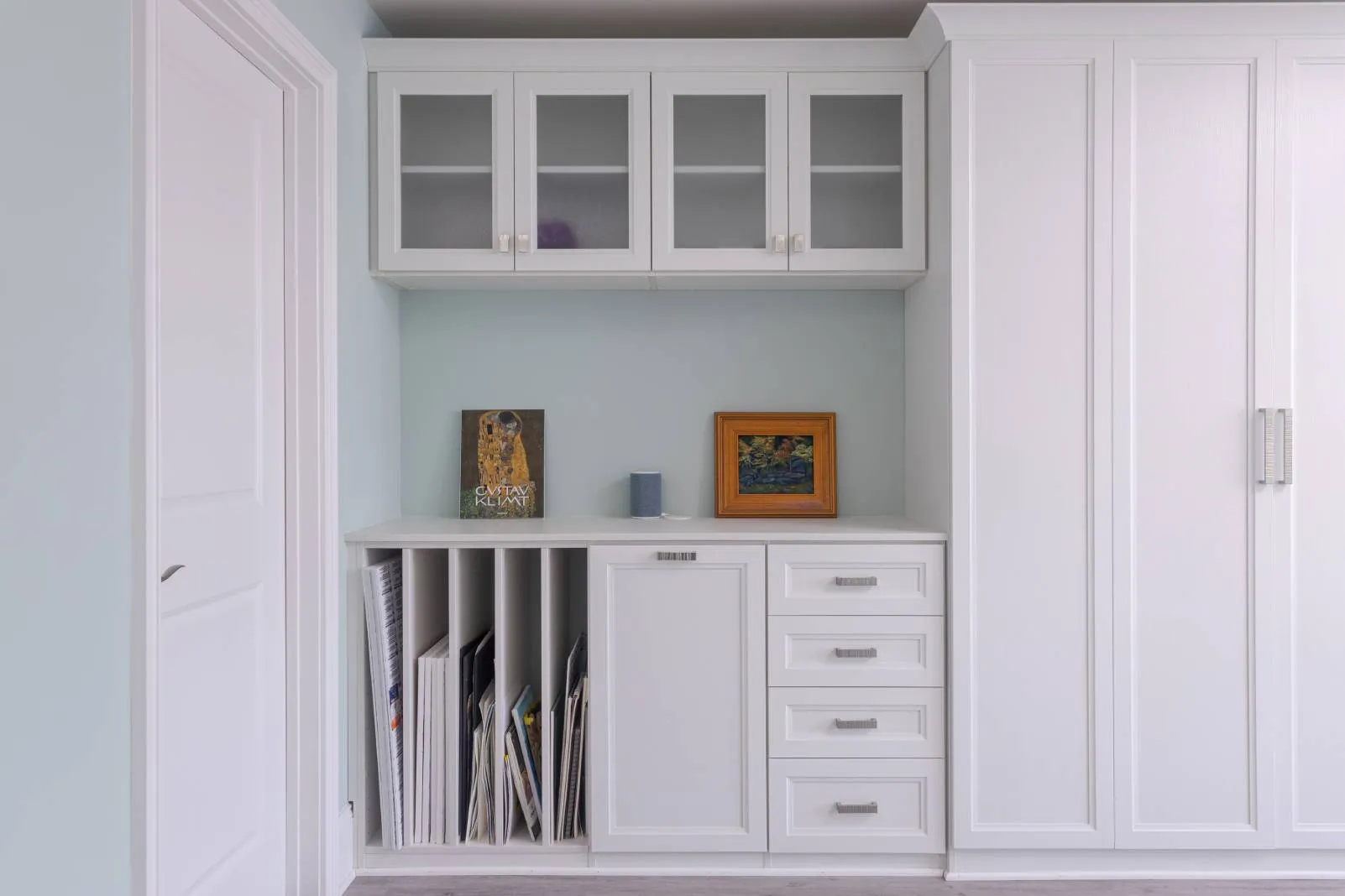 Murphy bed art room combination with vertical storage