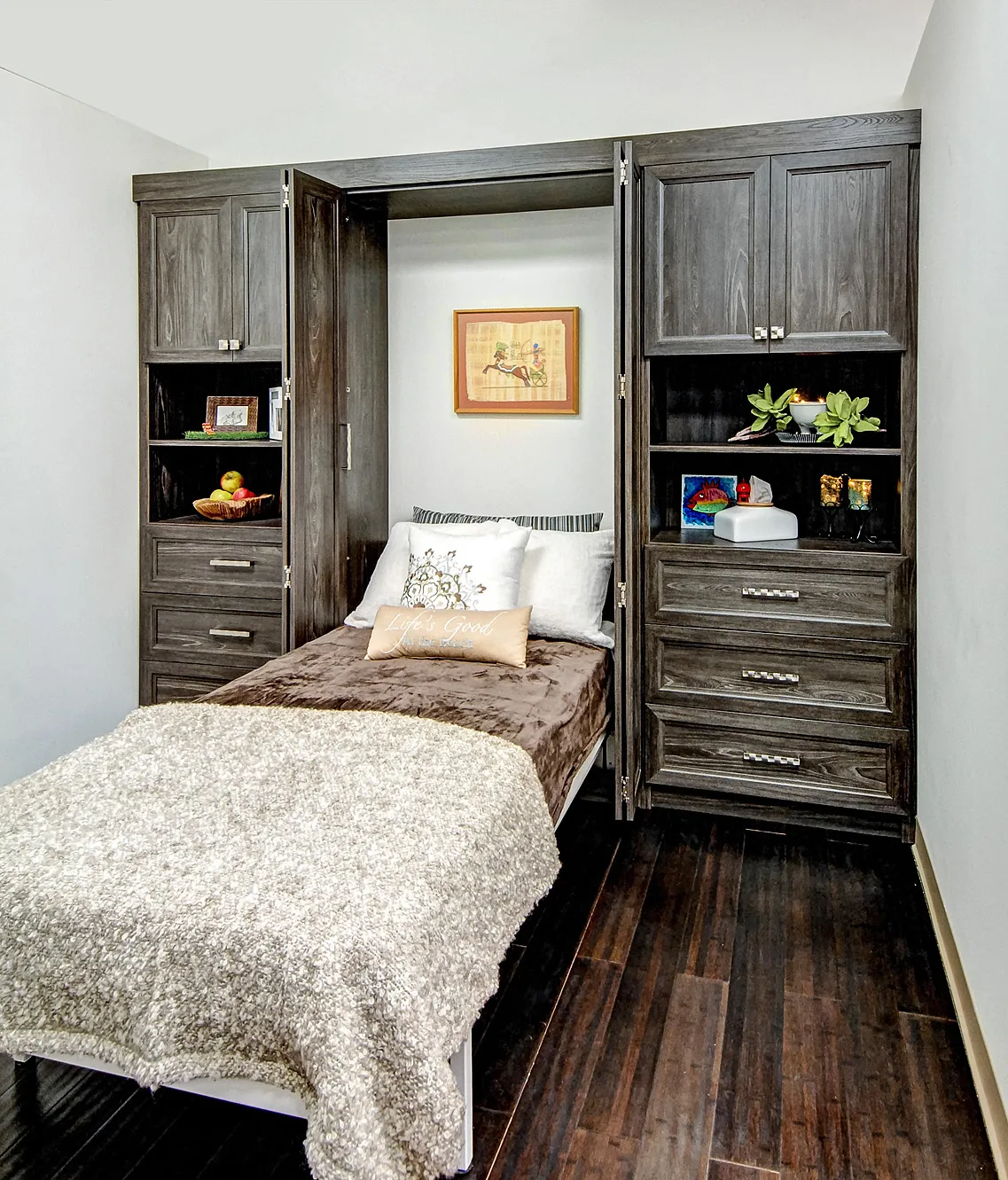 Murphy bed open in wood cabinet