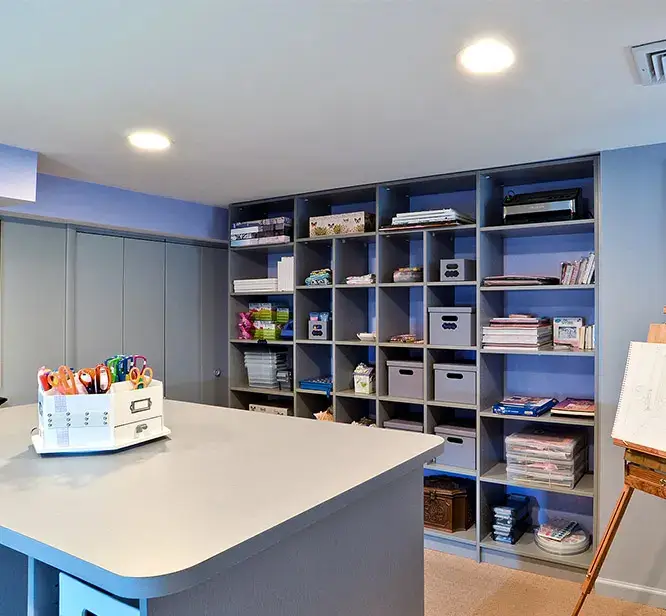 Craft room with center island and cubbies for storage